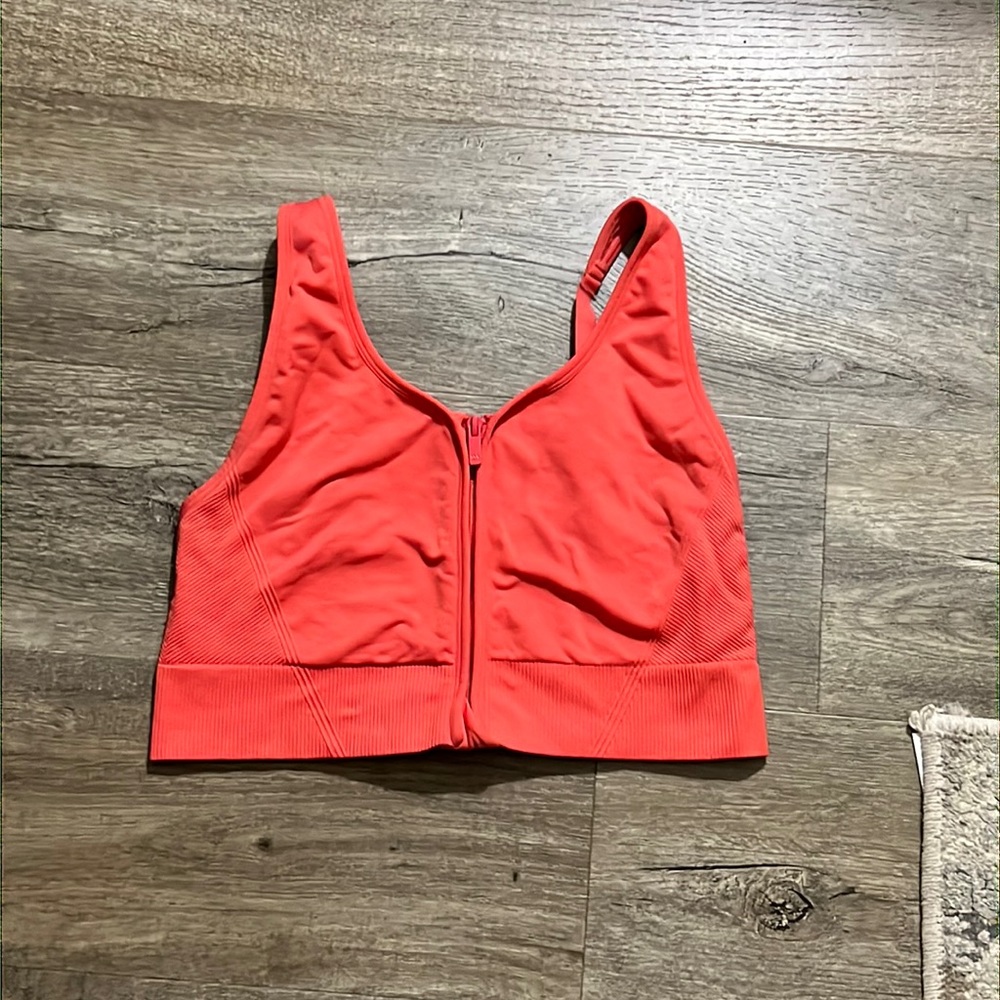 Coral colored sports bra